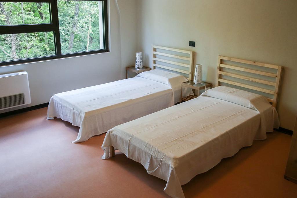 Oasi Hostel Merone Bilik gambar